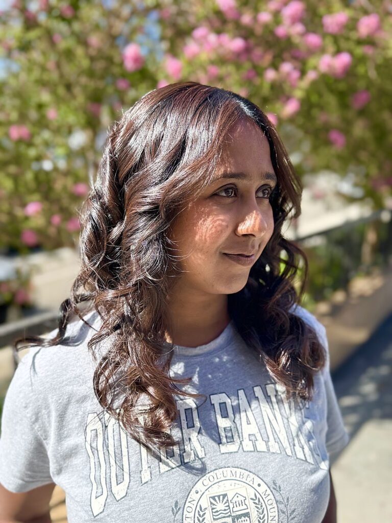 Client with soft, bouncy brunette curls